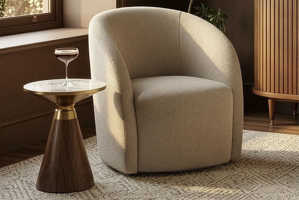 Coddle Bromley Swivel Chair next to a small round table with a glass on a patterned rug