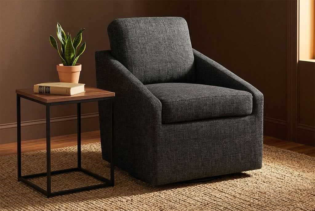 Huxley Swivel Chair in a room with a small table and plant