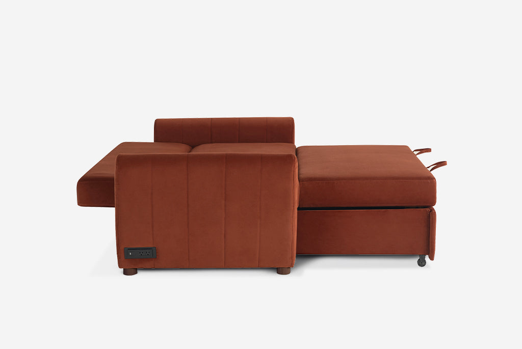 Rust colored Coddle sectional sofa on a white background