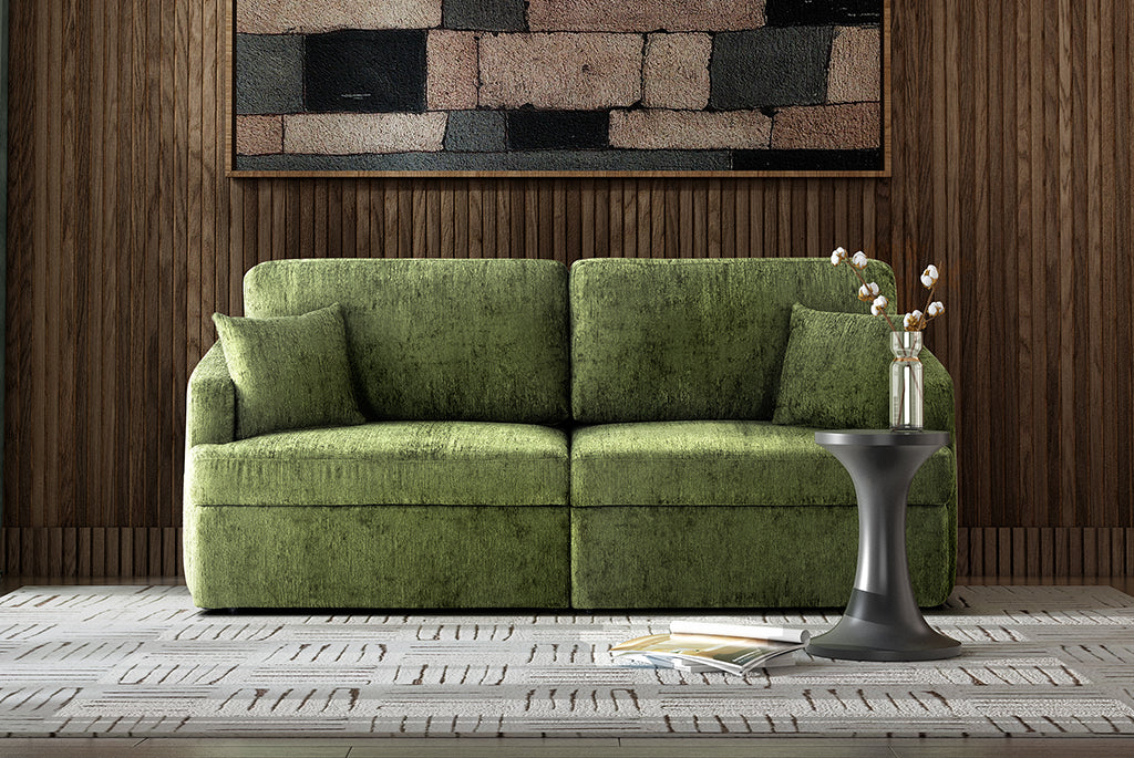 Green Matrix Queen-Sized Sleeper Sofa in a living room setting with a wooden wall and decorative elements