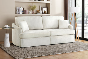 White Matrix Queen-Sized Sleeper Sofa in a living room with a rug and decorative items