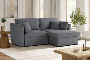 Gray Coddle sectional sofa in a living room setting with decor elements